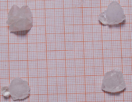 The grown γ-glycine crystal from potassium bromide.