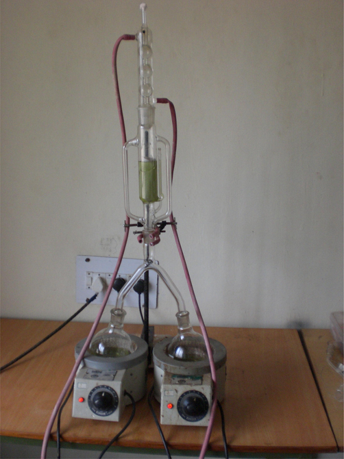 Double bypasses sidearm soxhlet extractor connected with two distillation flasks through inverted Y-shaped joint.