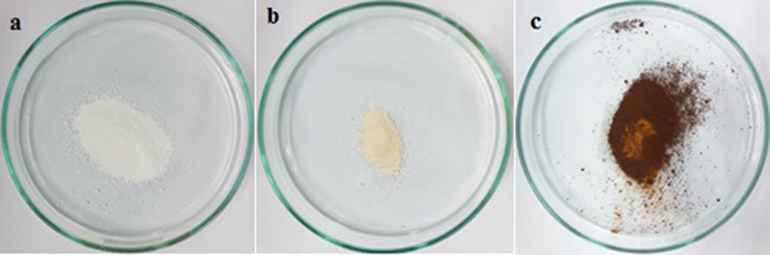 Photographs of the sample Z2 (0.002): (a) As-synthesized, (b) 600 °C for 12 h, and (c) 600 °C for 24 h.