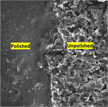 SEM image at the boundary between the unpolished and polished metallic Ti sample in 1 ChCl: 2 PG at 10 V for 40 min at 20 °C.