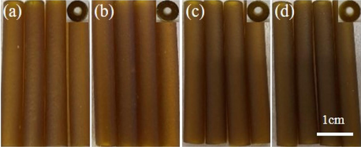 Photographs of prepared propellants with NPs contents of (a) 0 wt%, (b) 0.4 wt%, (c) 0.8 wt%, (d) 1.6 wt%.